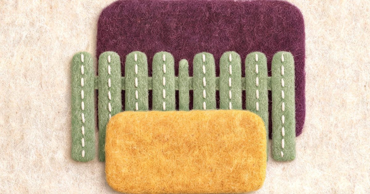 A felt textile illustration of a tall plum block behind a stitched fence with a smaller mustard block in front, showing that Muse Wonder Full sits inside a subscription while Muse Wonder is sold by the token